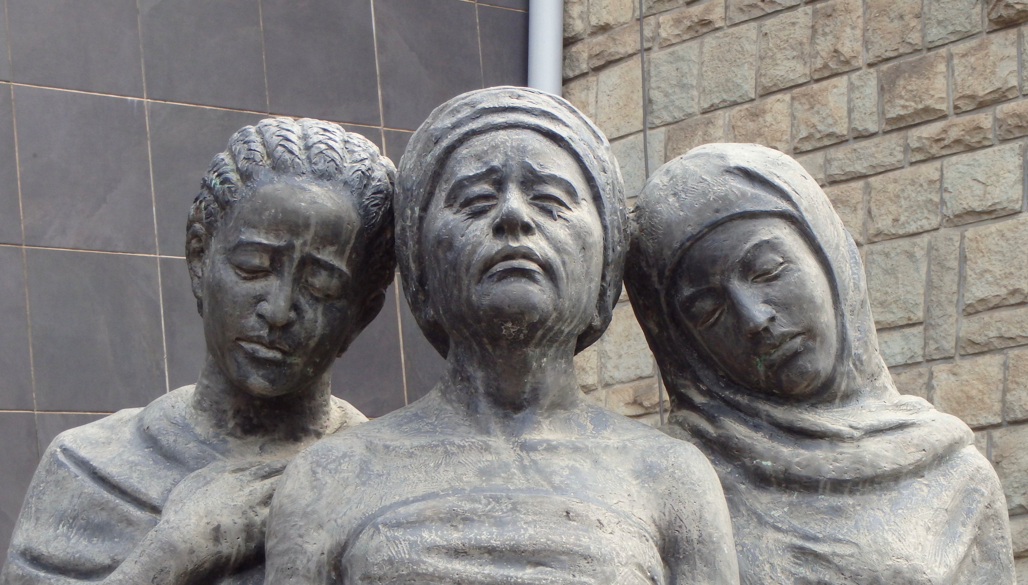 statue in of three women in the Red Terror Memorial