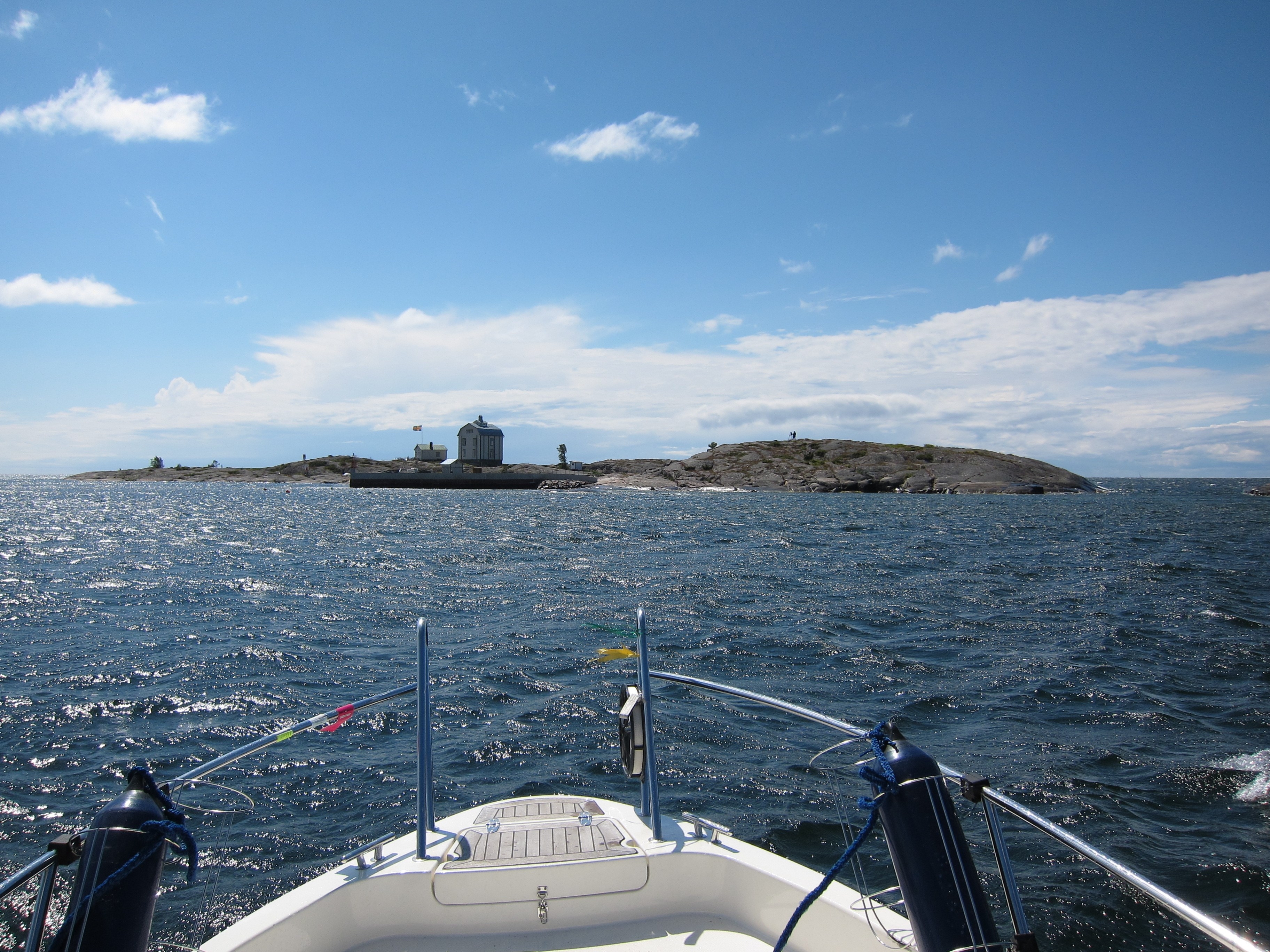 Motor boat at blue Baltic Sea on a beautiful sunny day, Aland, Finland.
