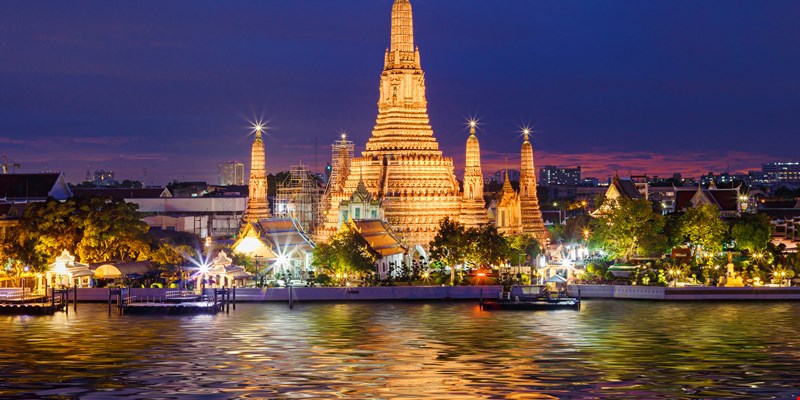 Wat Arun Temple at twilight in Bangkok, Thailand.
