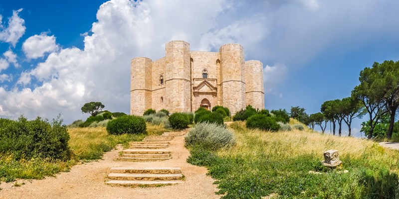Beautiful view of Castel del Monte, the famous castle built in an octagonal shape by the Holy Roman Emperor Frederick II in the 13th century in Apulia, southeast Italy