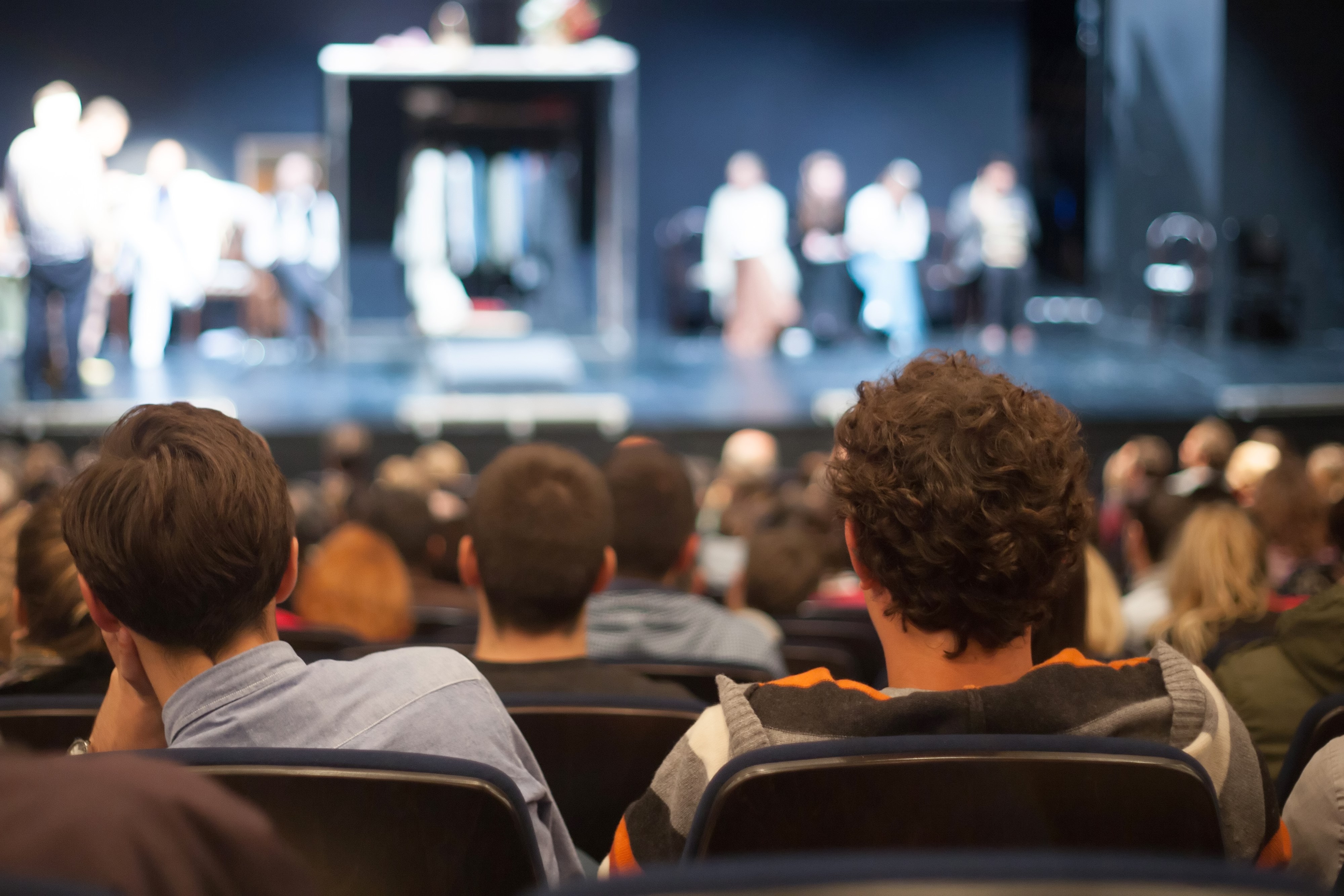 audience watching theater play