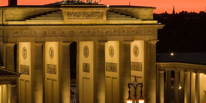 woman in front of the Brandenburg Gate, Berlin, Germany