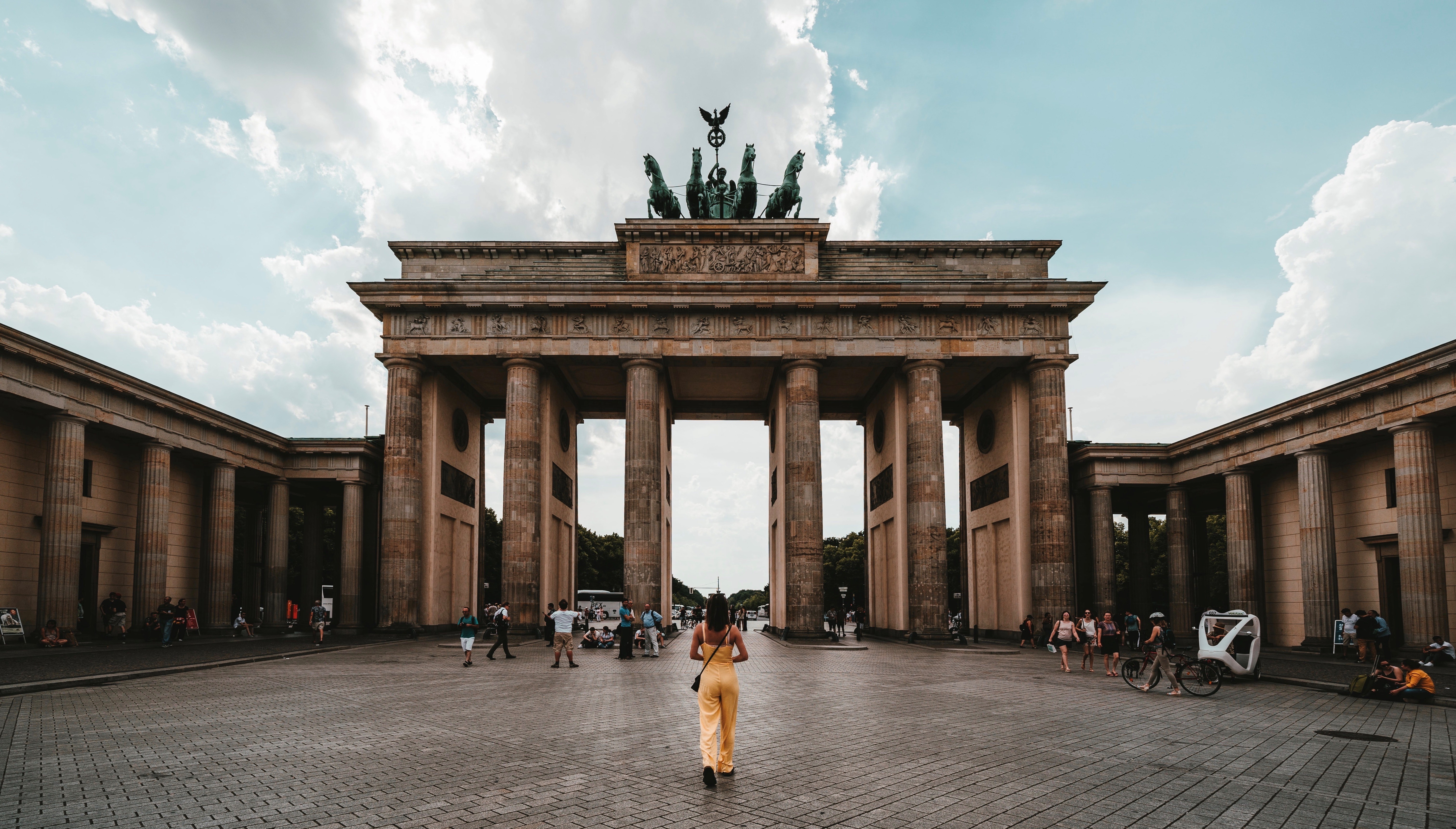 woman in front of the Brandenburg Gate, Berlin, Germany