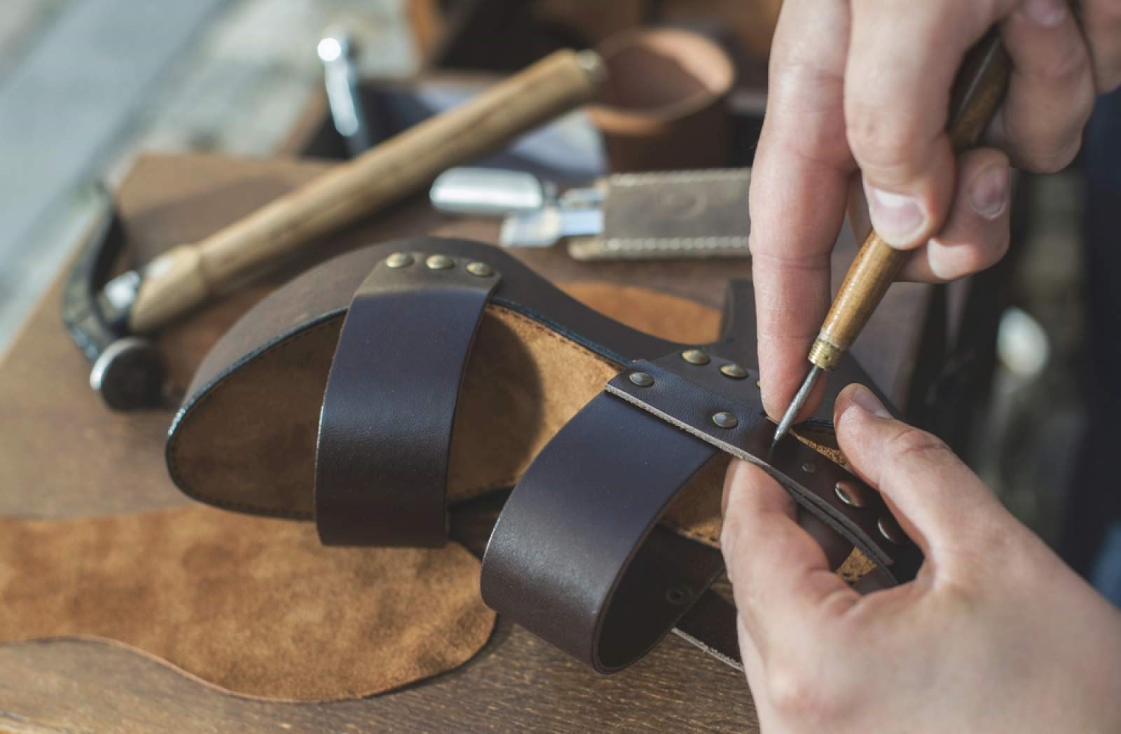 Leather shoes being made