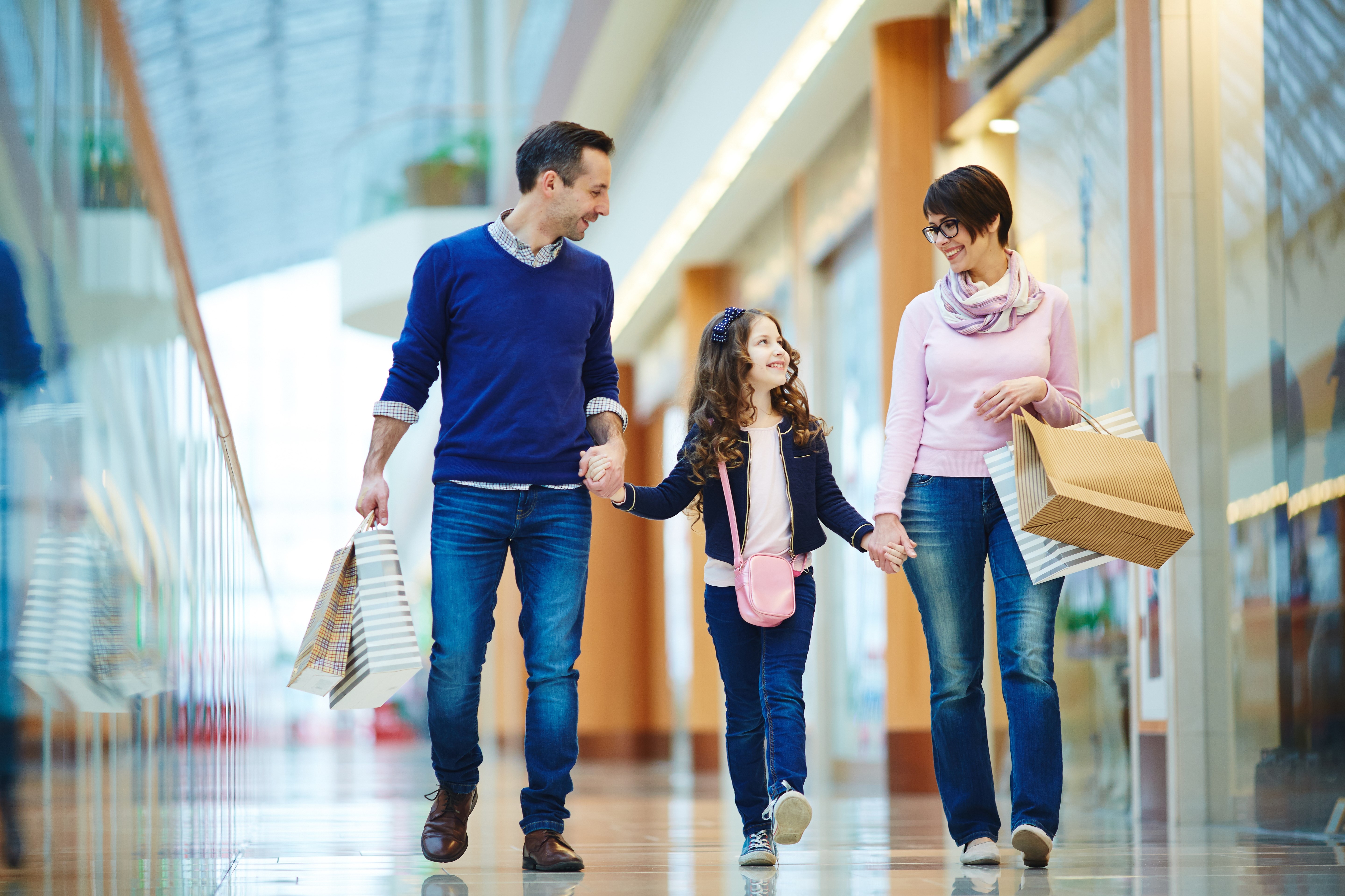 family happy in shopping mall