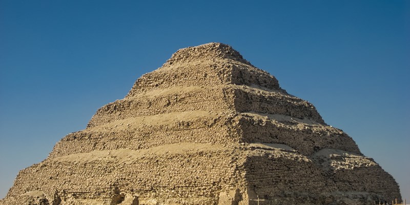 View of the Pyramid of Djoser or Step Pyramid at the necropolis of Saqqara, near Cairo city, Egypt.