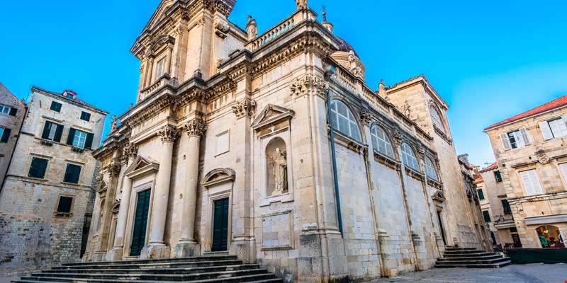 Majestic cathedral in old town Dubrovnik, famous historic and touristic destination in Europe. / Selective focus.