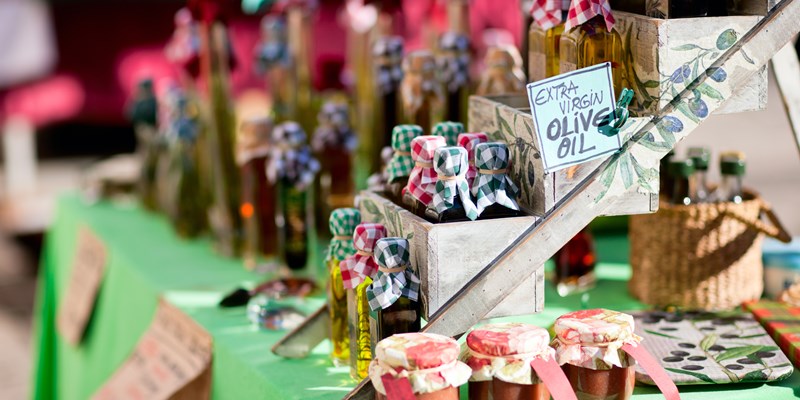 Close up of extra virgin olive oil and marmalade at market in Dubrovnik Croatia