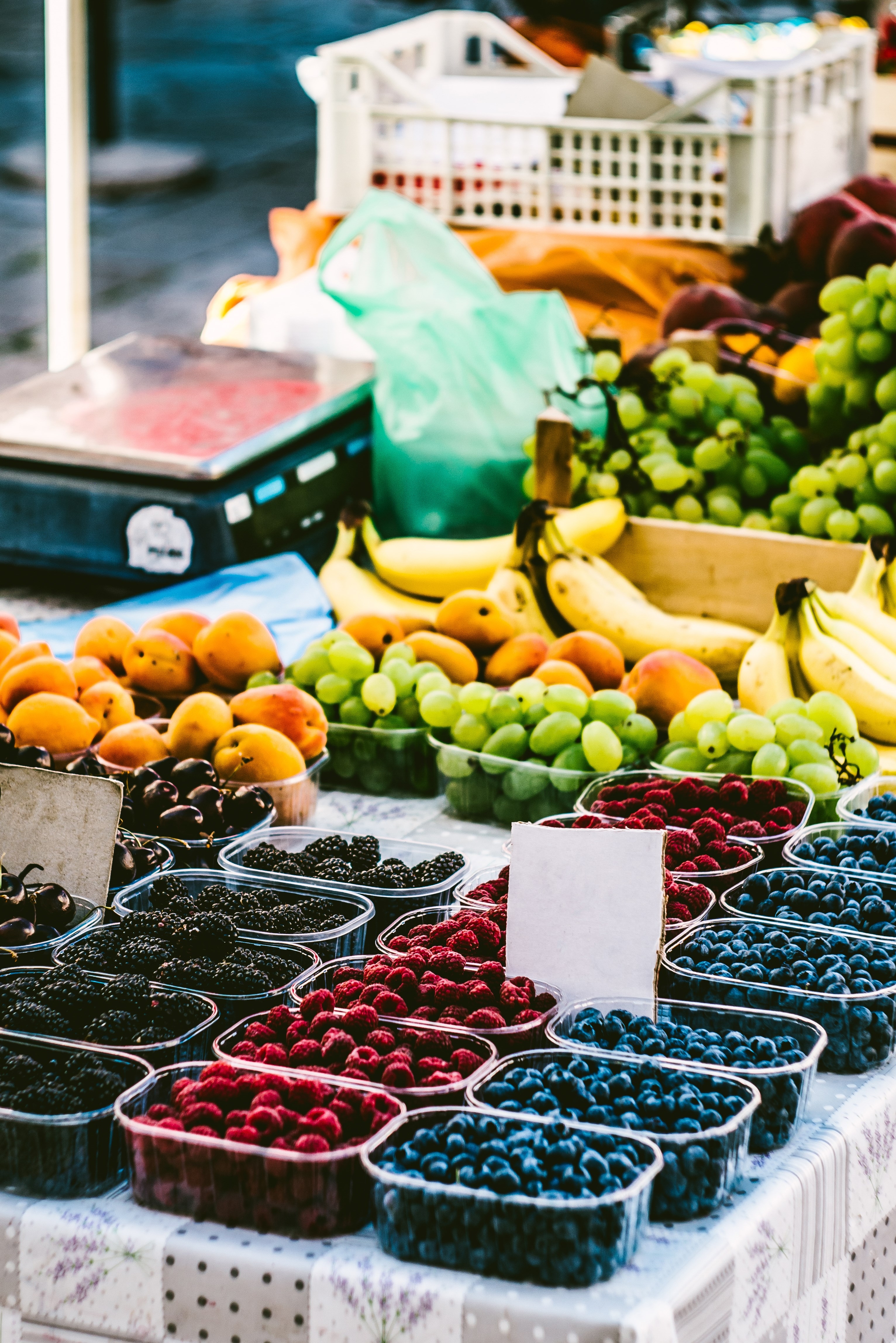 Berries in boxes on the market. Market Showcase with berries. The market in the old town of Dubrovnik, Croatia.