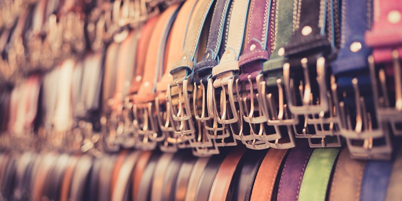 A number of belts in a Florence market.