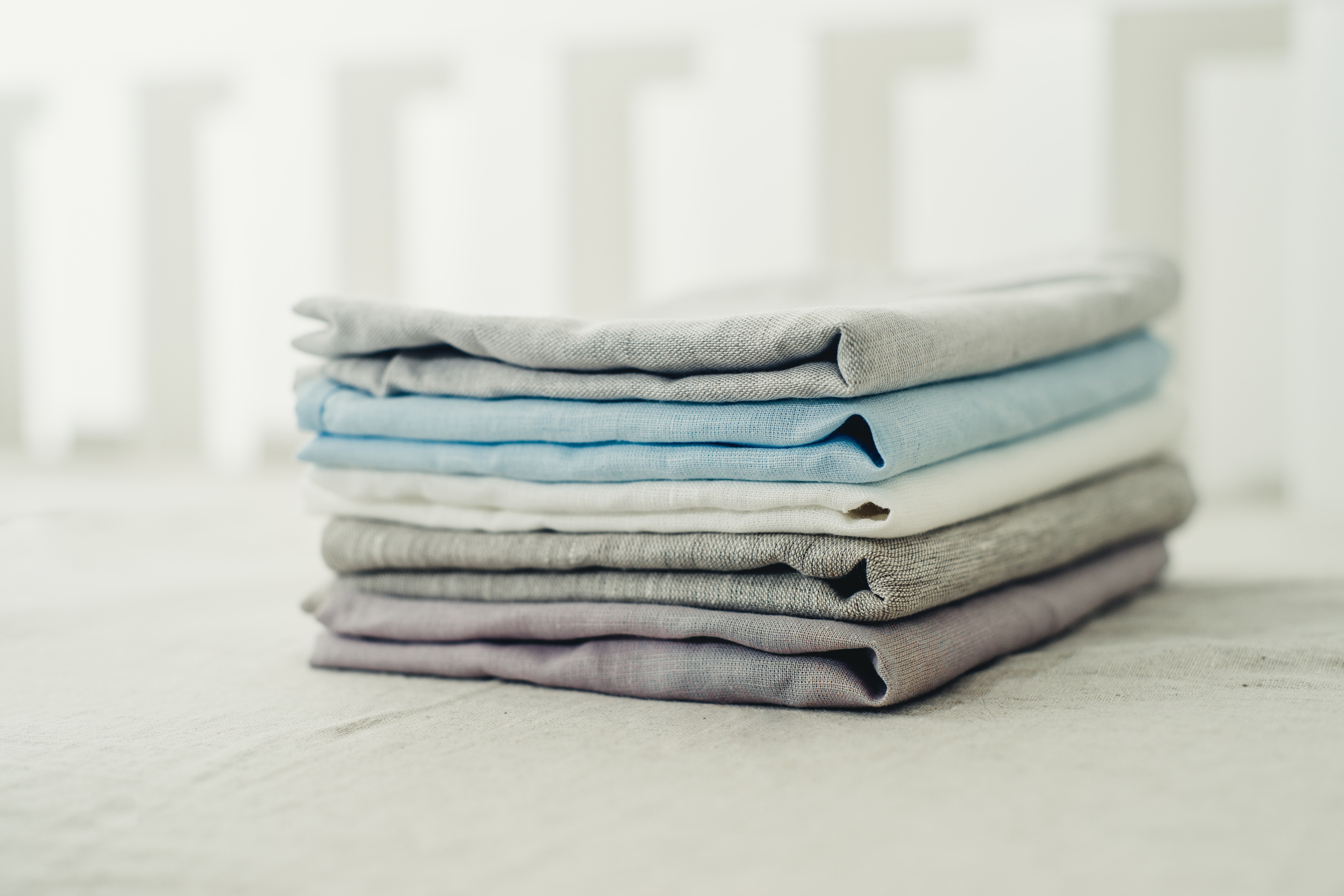 a set of plain linen bedding close-up