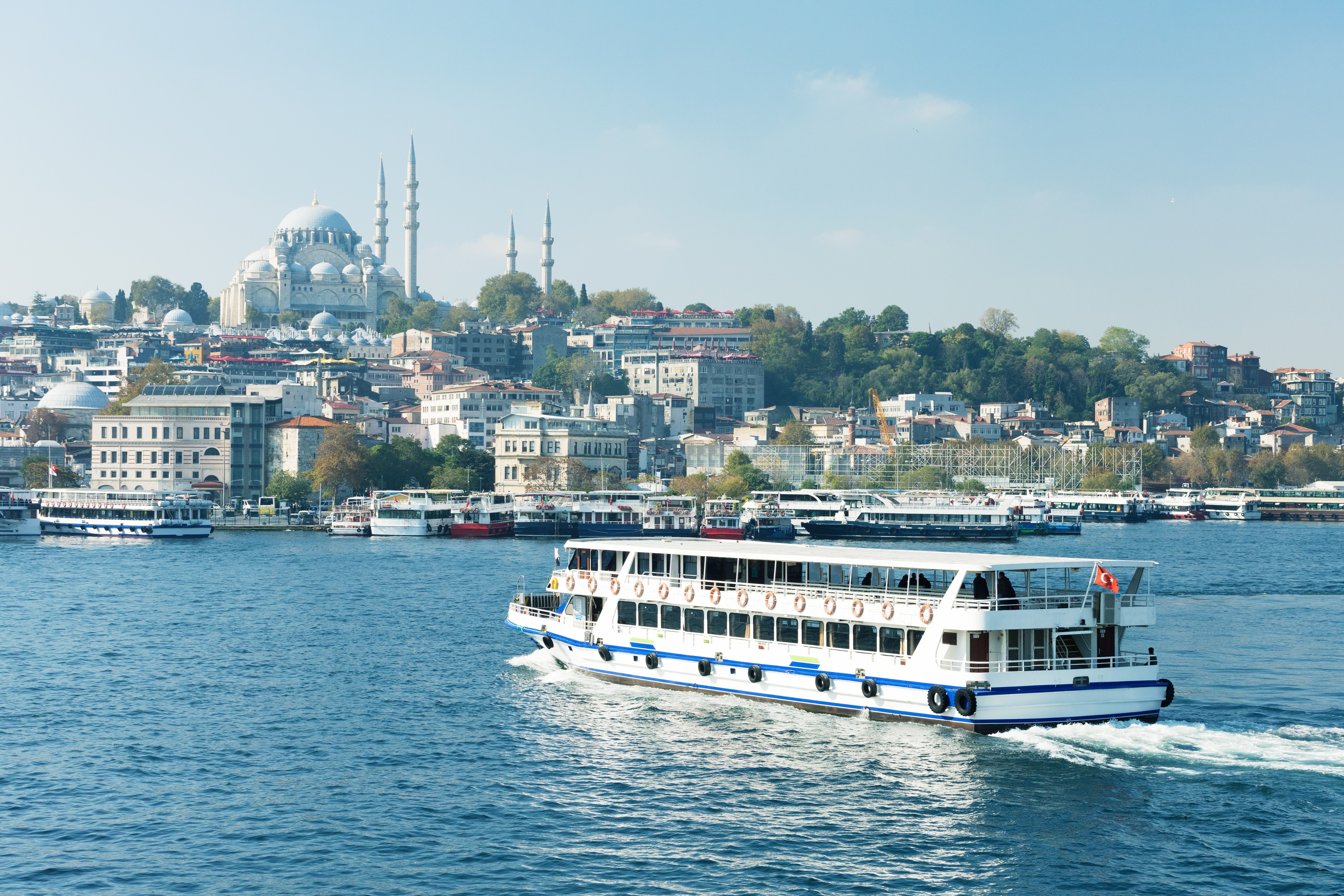 Passenger white ship on Bosphorus, Istanbul, Tukkey. Summer, spring vacation concept. Public water transport.