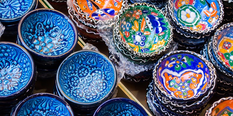 Traditional Cretan painted ceramic dishes for sale at a city centre shop along Odos 1821, Heraklion, Crete, Greece, Europe.