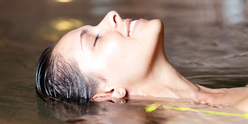 Beautiful woman relaxing in a jacuzzi