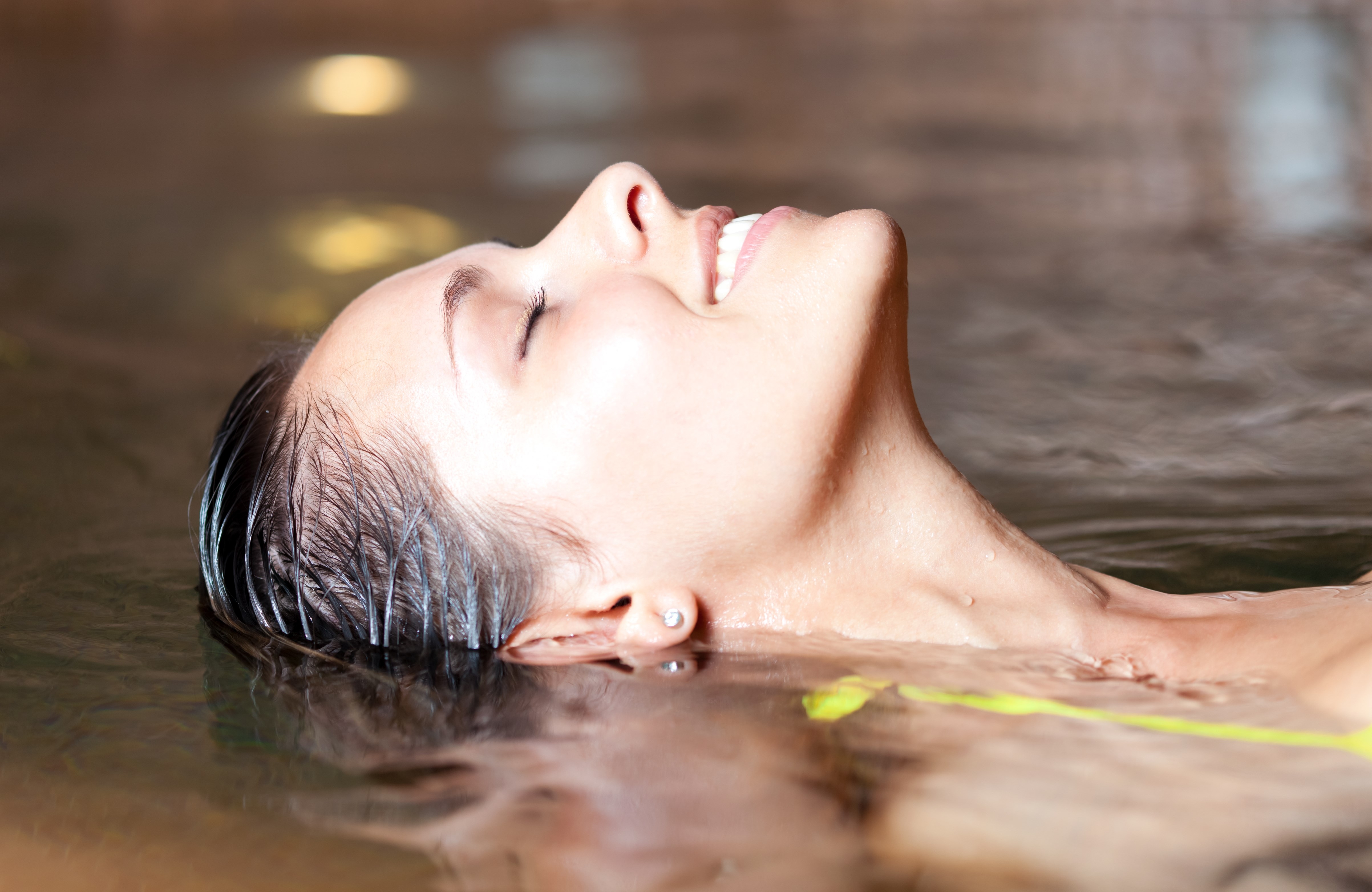Beautiful woman relaxing in a jacuzzi
