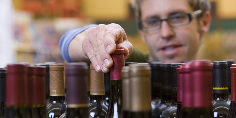 Man at a wine shop in Madrid, Spain