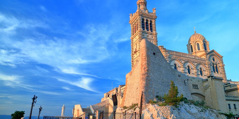 Sunset light illuminates the Church Notre Dame de la Garde, Marseille, France