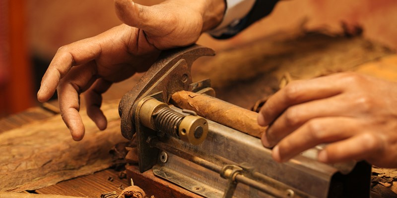 hand making cigars