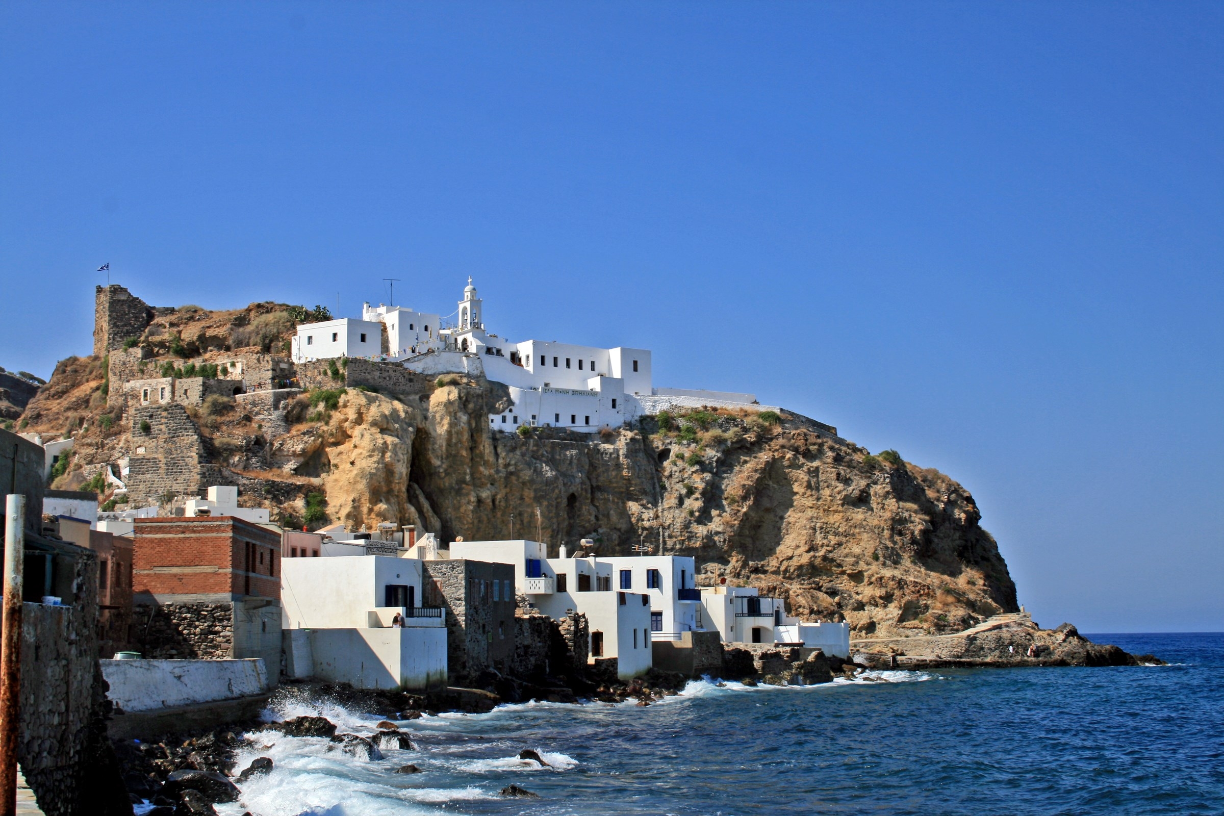 Monastery Panagia Spiliani over small town Mandraki on Nisyros island (Greece)