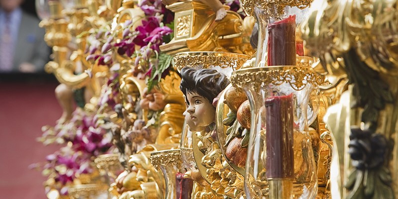 Cherub on wood carving, holy week, Seville, Andalusia, Spain