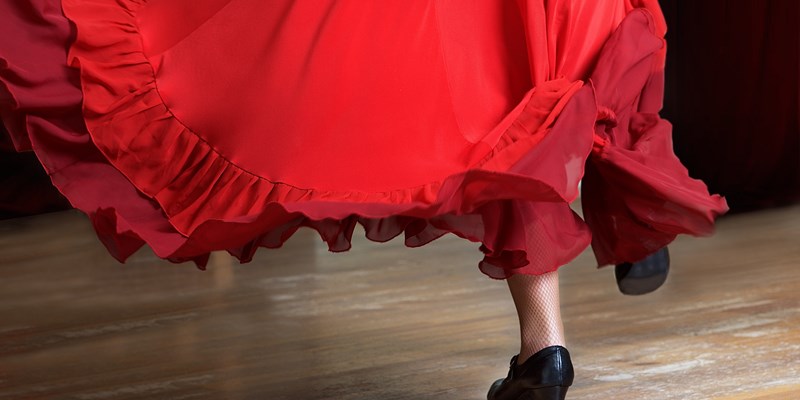 Photo of flamenco dancer. Legs fragment photo of spanish flamenco dancer. Only legs cropped