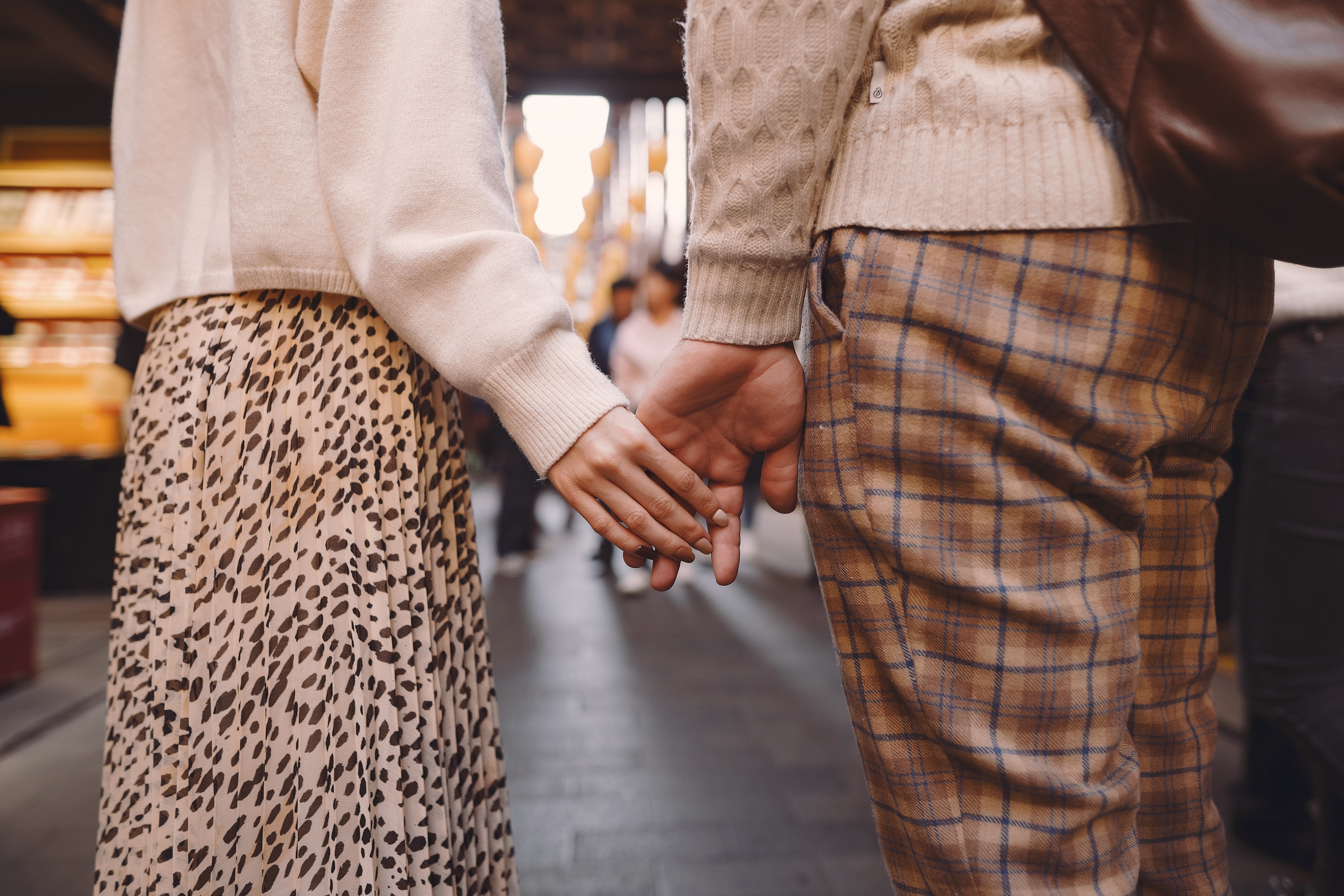 newlywed couple showing affection and holding hands in Shanghai