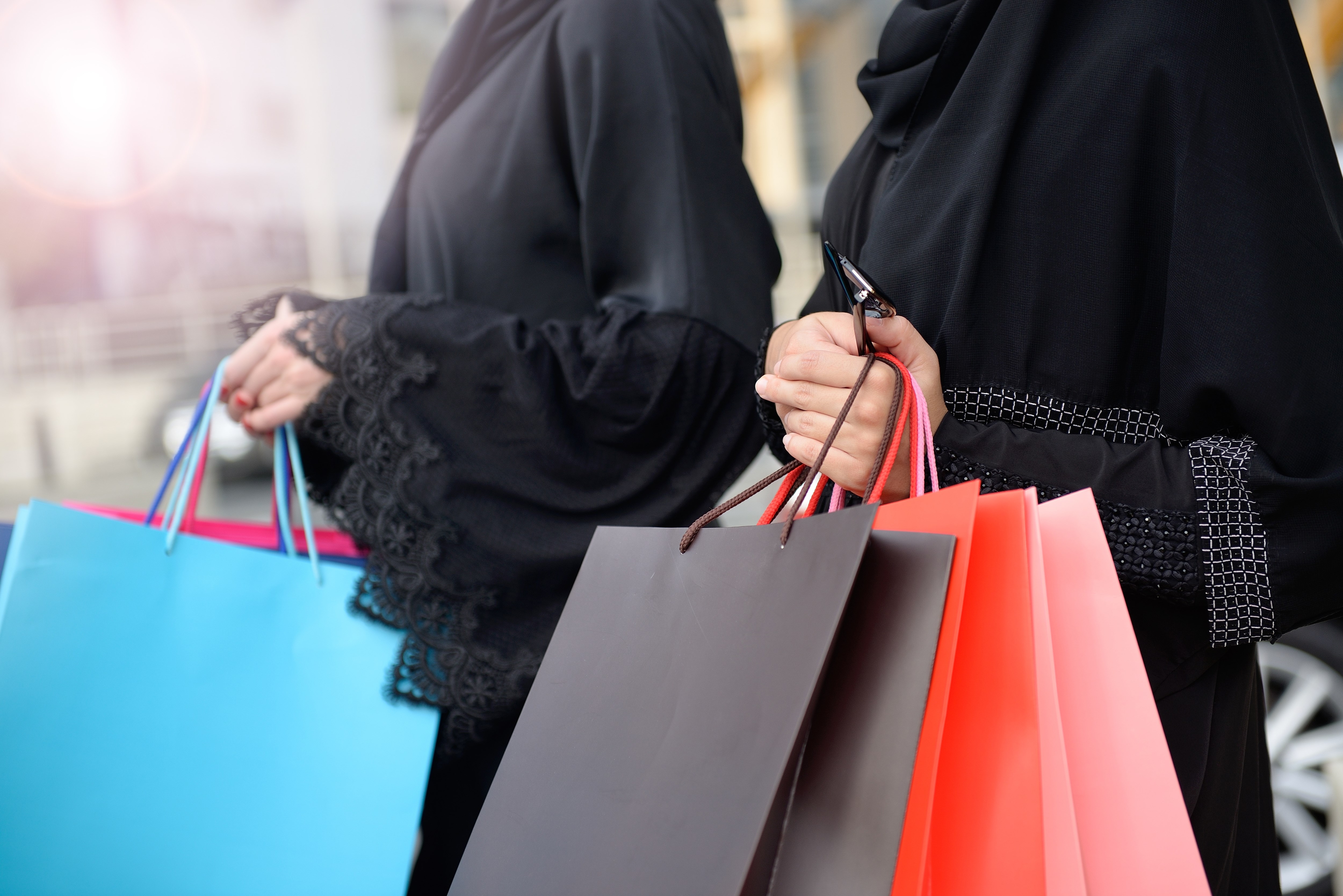 Emarati Arab women coming out of shopping