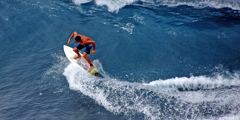 Surfer Riding a Wave