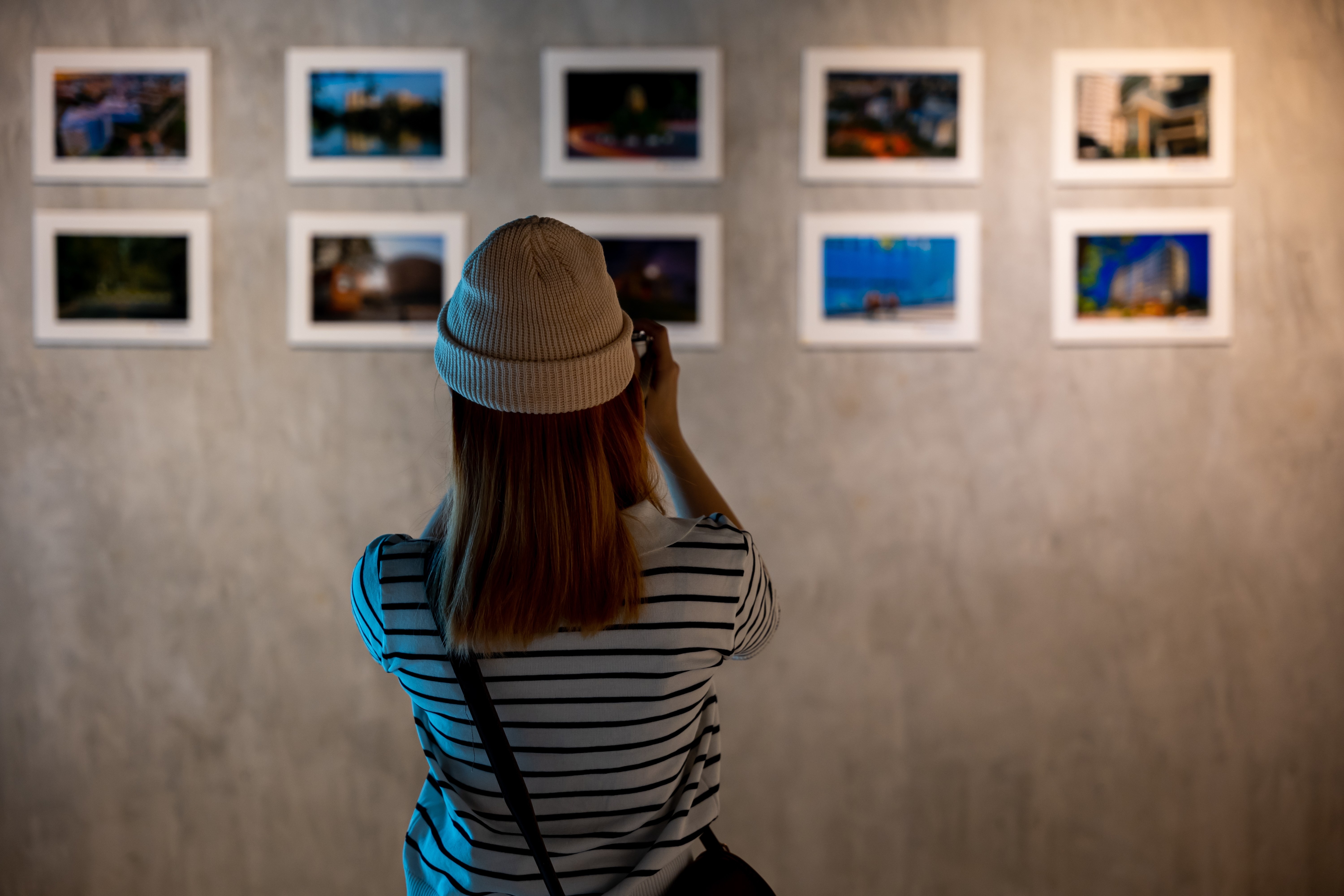 Photographer visit at photo frame to leaning against at show exhibit artwork gallery