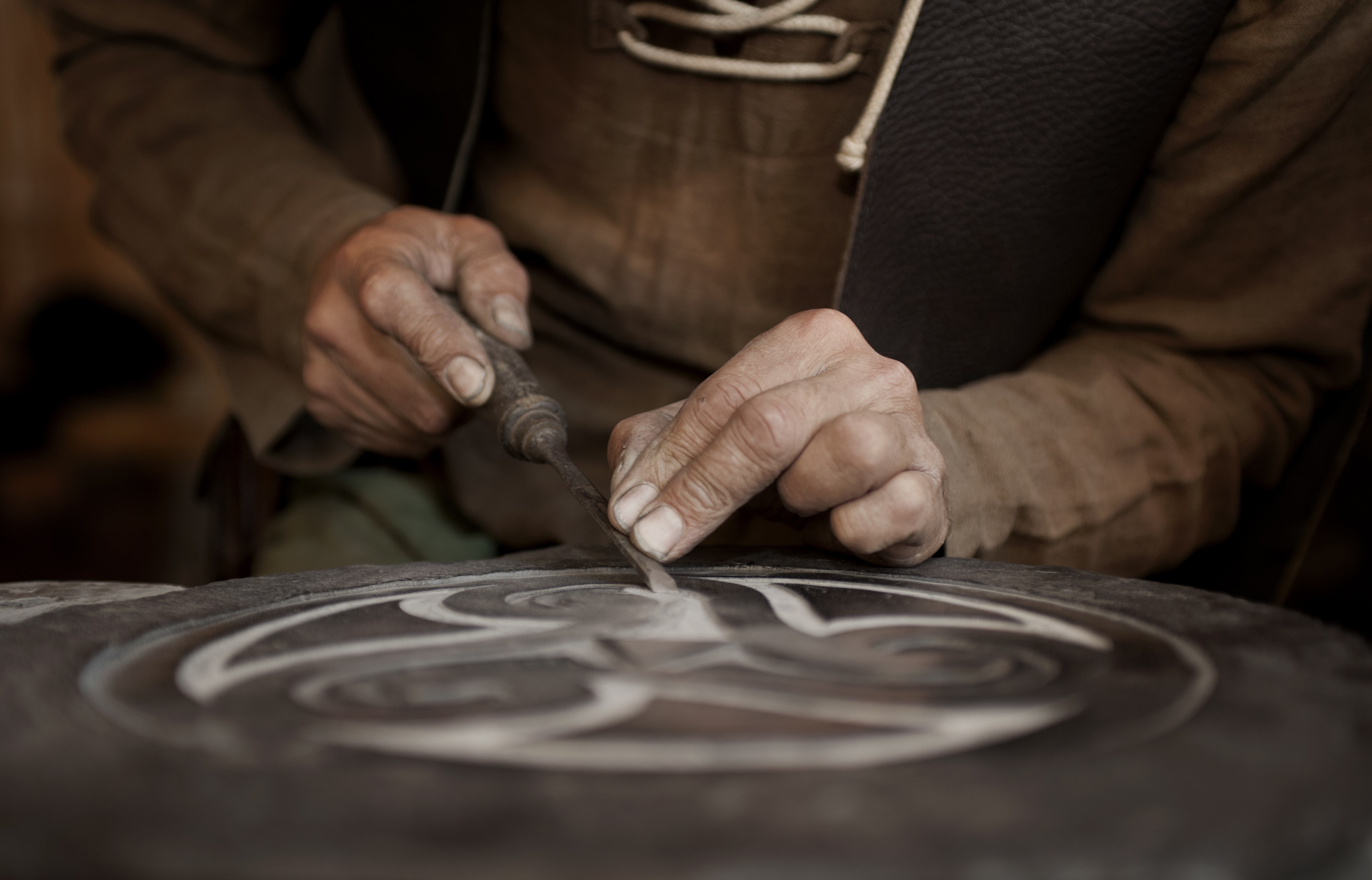 Craftsman working on stone