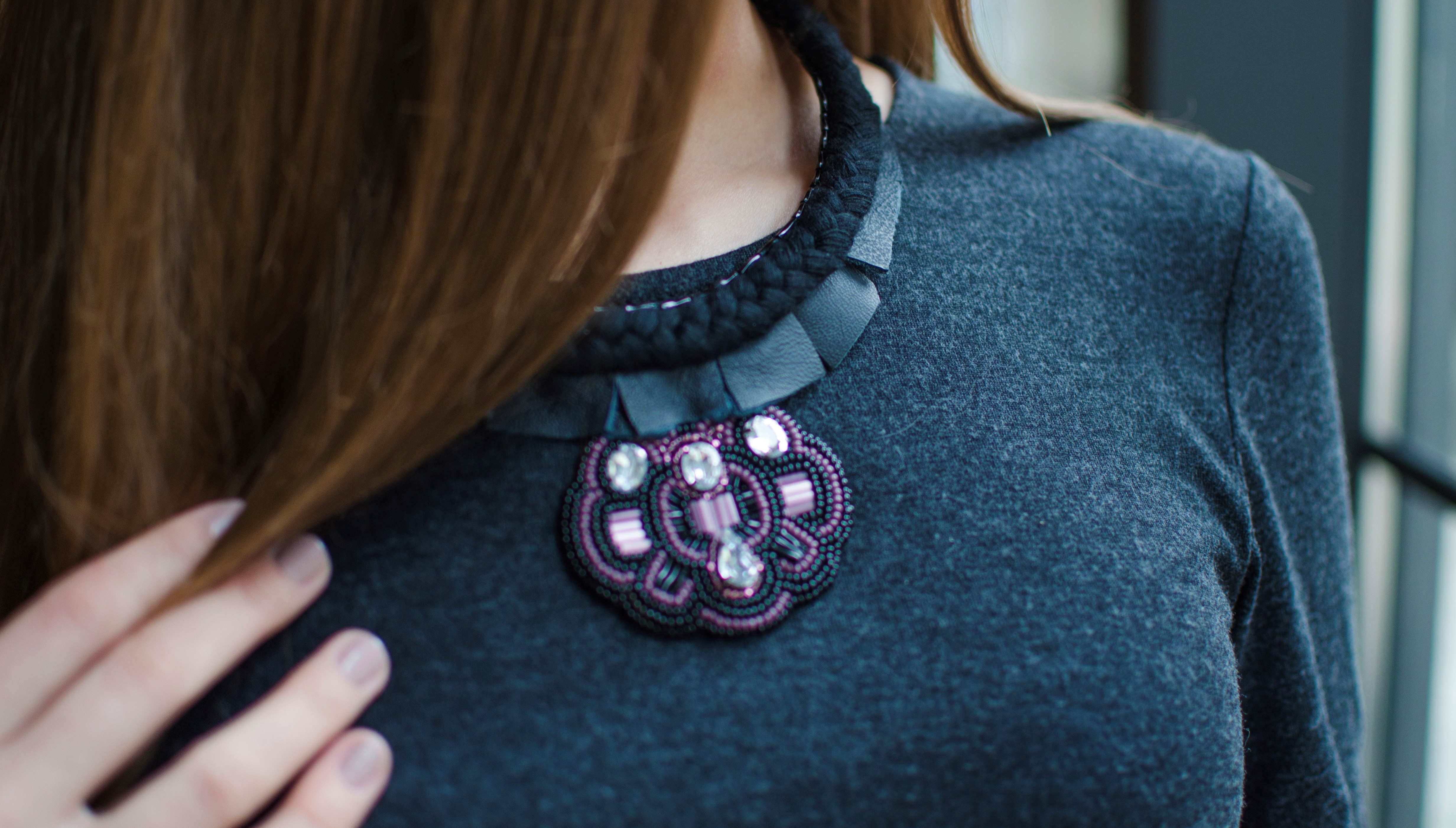 Beaver necklaces and stone necklace around his neck