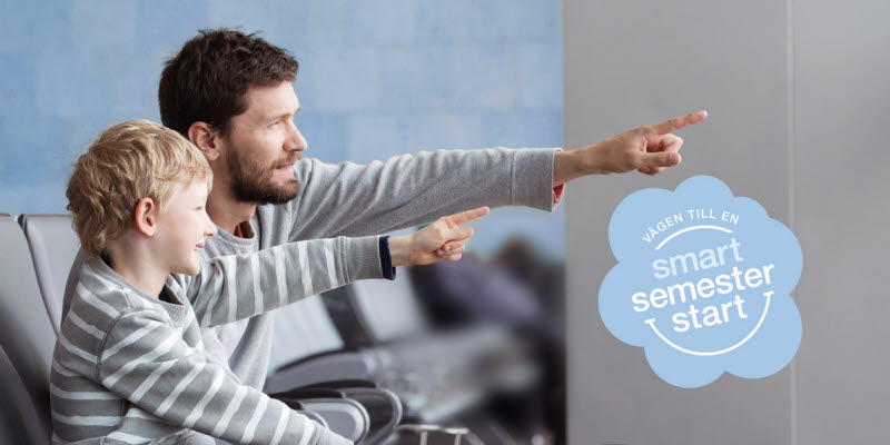 En man och en pojke pekar framåt En man och en pojke pekar framåt