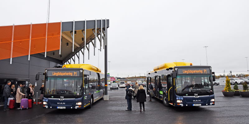 Two buses in the new car park Two buses in the new car park