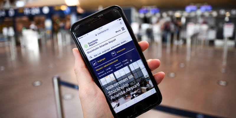 En mobilskärm som visar väntetider i säkerhetskontrollen på Arlanda En mobilskärm som visar väntetider i säkerhetskontrollen på Arlanda
